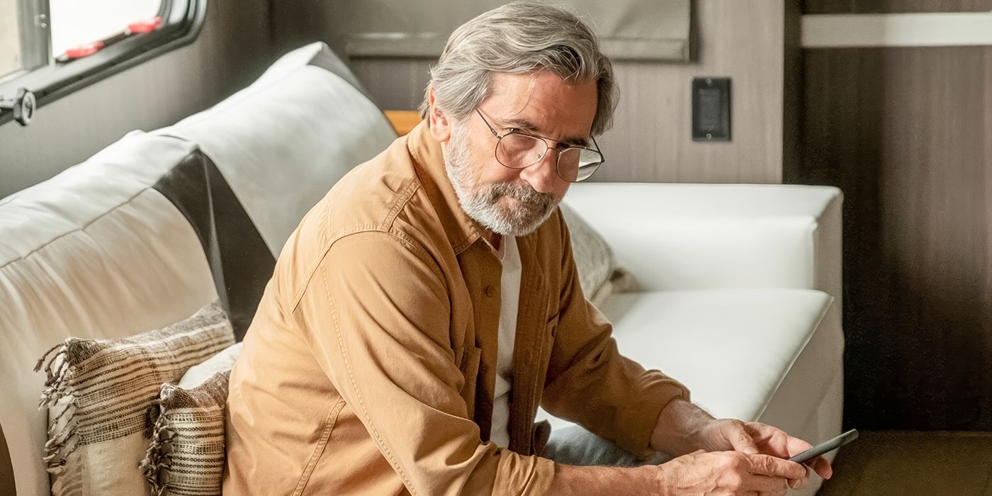Griffin Dunne smiling and looking up in This Is Us