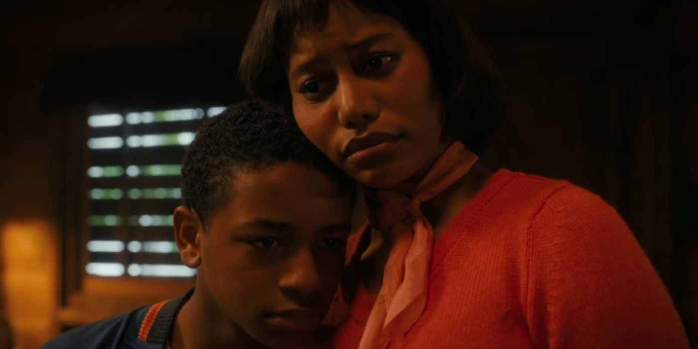 Charlotte (Taylour Paige) holds Will (Blake Cameron James) in 'IT: Welcome to Derry'