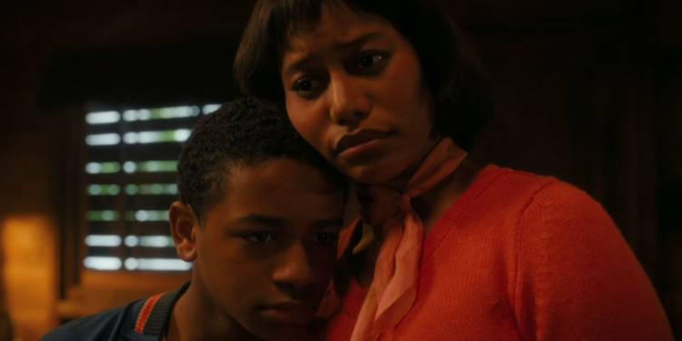 Charlotte (Taylour Paige) holds Will (Blake Cameron James) in 'IT: Welcome to Derry'