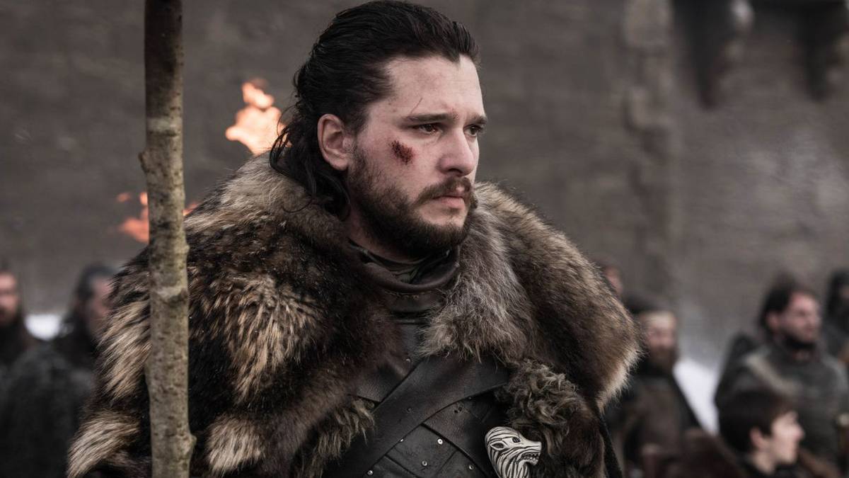 Jon Snow in fur holding a torch