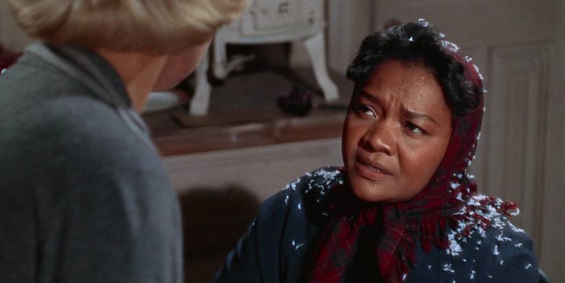 Juanita Moore looks up at Lana Turner in the film "Imitation of Life" (1959)