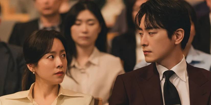 Han Ji-min and Lee Joon-hyuk looking intensely at each other in a crowd in Love Scout.