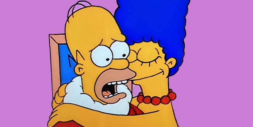 Marge (Julie Kavner) hugs Homer (Dan Castellaneta) wearing a Santa suit in The Simpsons' "Simpsons Roasting on an Open Fire."