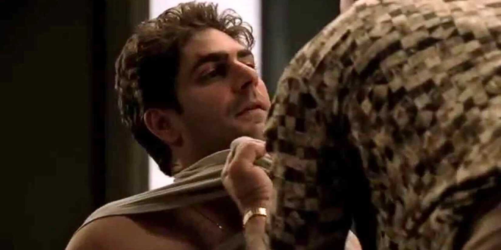 Michael Imperioli as Christopher Moltisanti being pulled by the collar of his shirt by James Gandolfini as Tony Soprano in The Sopranos episode The Strong, Silent Type