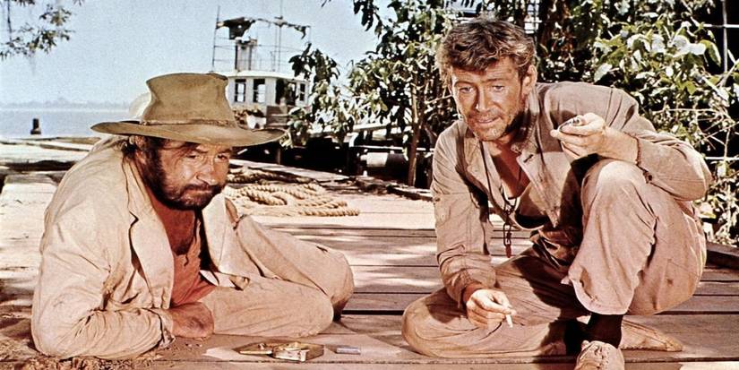 Two men looking at something off-camera in Murphy's War