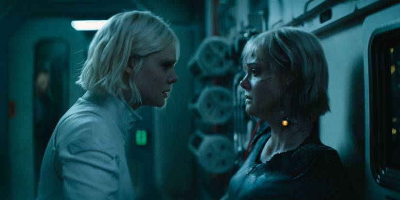 Tessa and Thia (both played by Elle Fanning) looking at each other in 'Predator: Badlands'