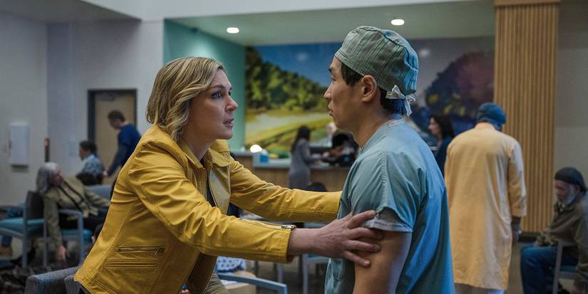 Carol holding onto a doctor in Episode 1 of 'Pluribus'
