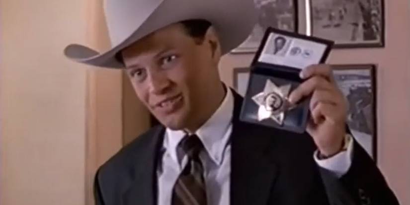 James LeGros as Raylan Givens, holding his badge, in 1997's TV film 'Pronto'