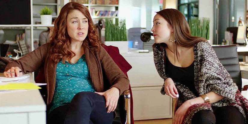 Kim (Erin Karpluk) in Riftworld Chronicles talking to a friend. 