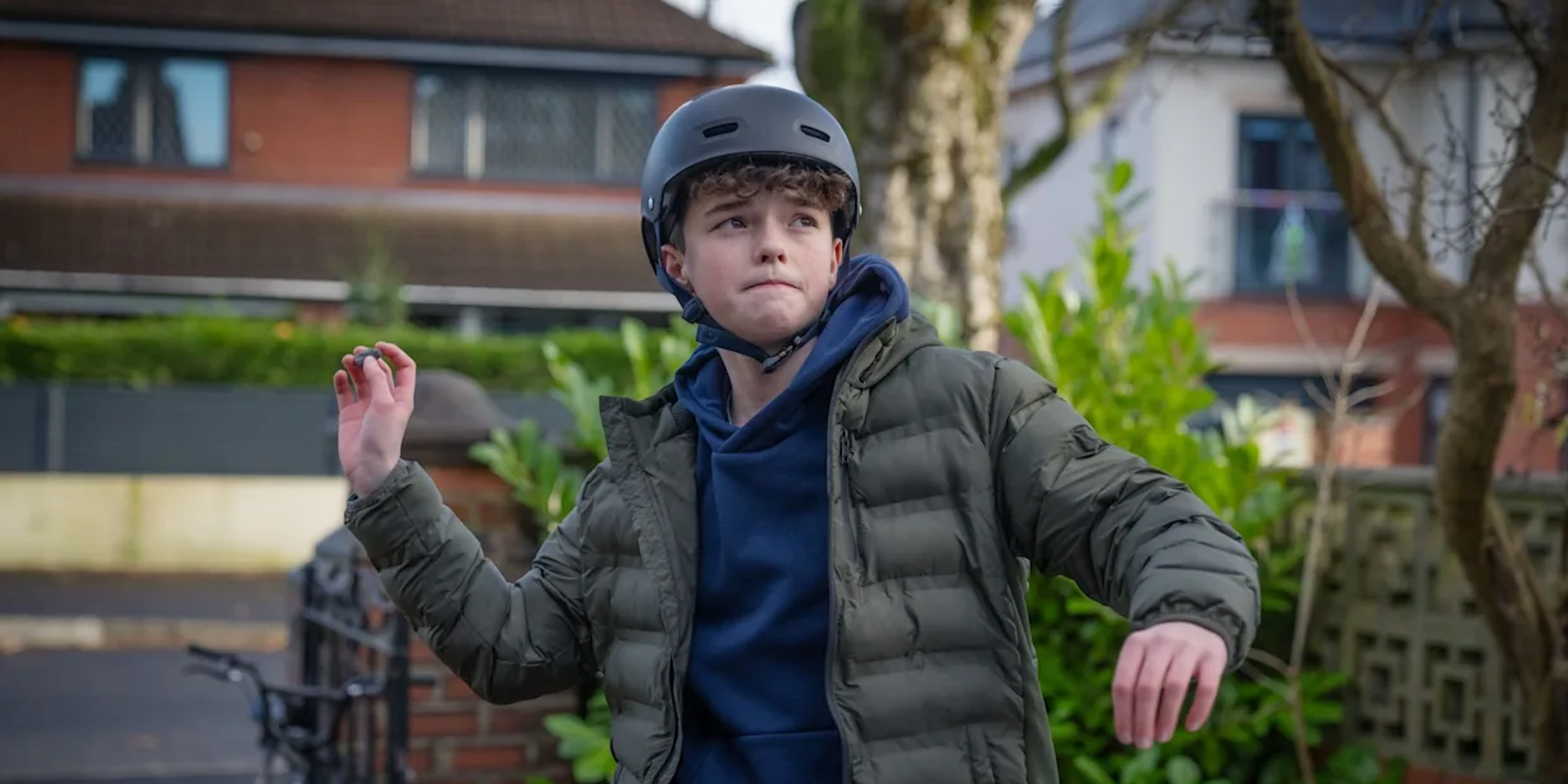 Callum (Owen Cooper) throws a rock at Evie's (Aimee Lou Wood) window in 'Film Club'