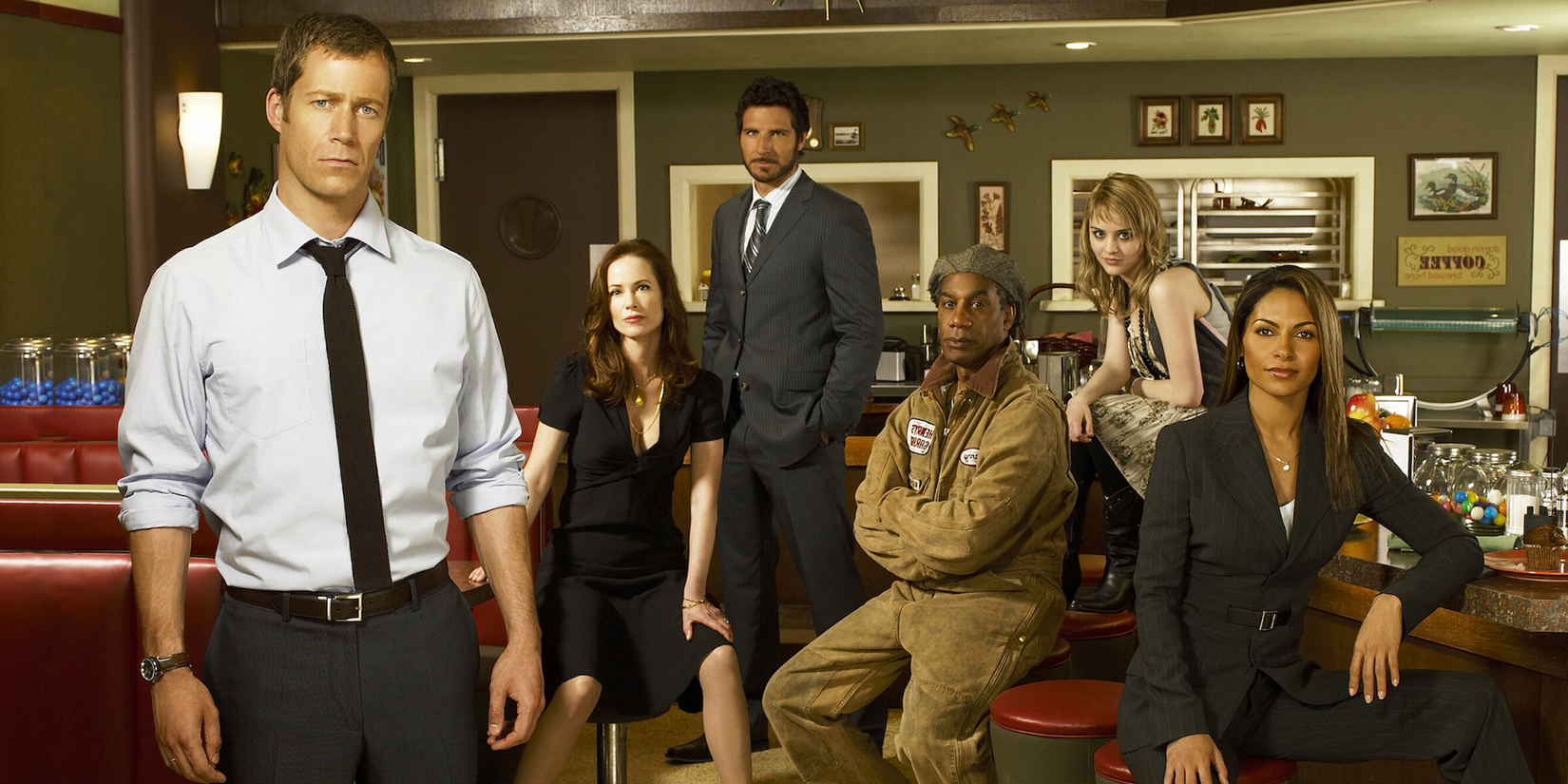 A poster of the cast of 'Eureka'