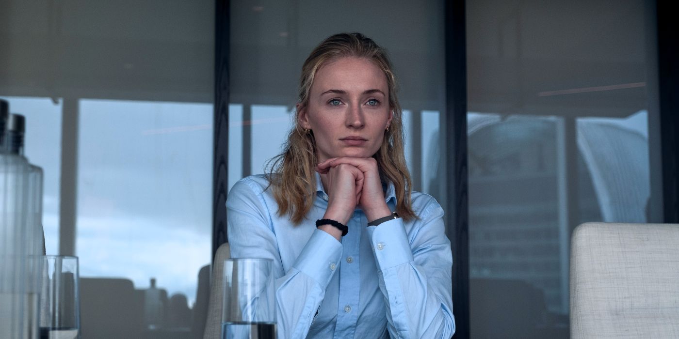 Sophie Turner resting her head on her folded hands in Steal.