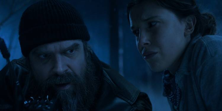 David Harbour as Hopper and Millie Bobby Brown as Eleven outside in the Upside Down on 'Stranger Things' Chapter 5.