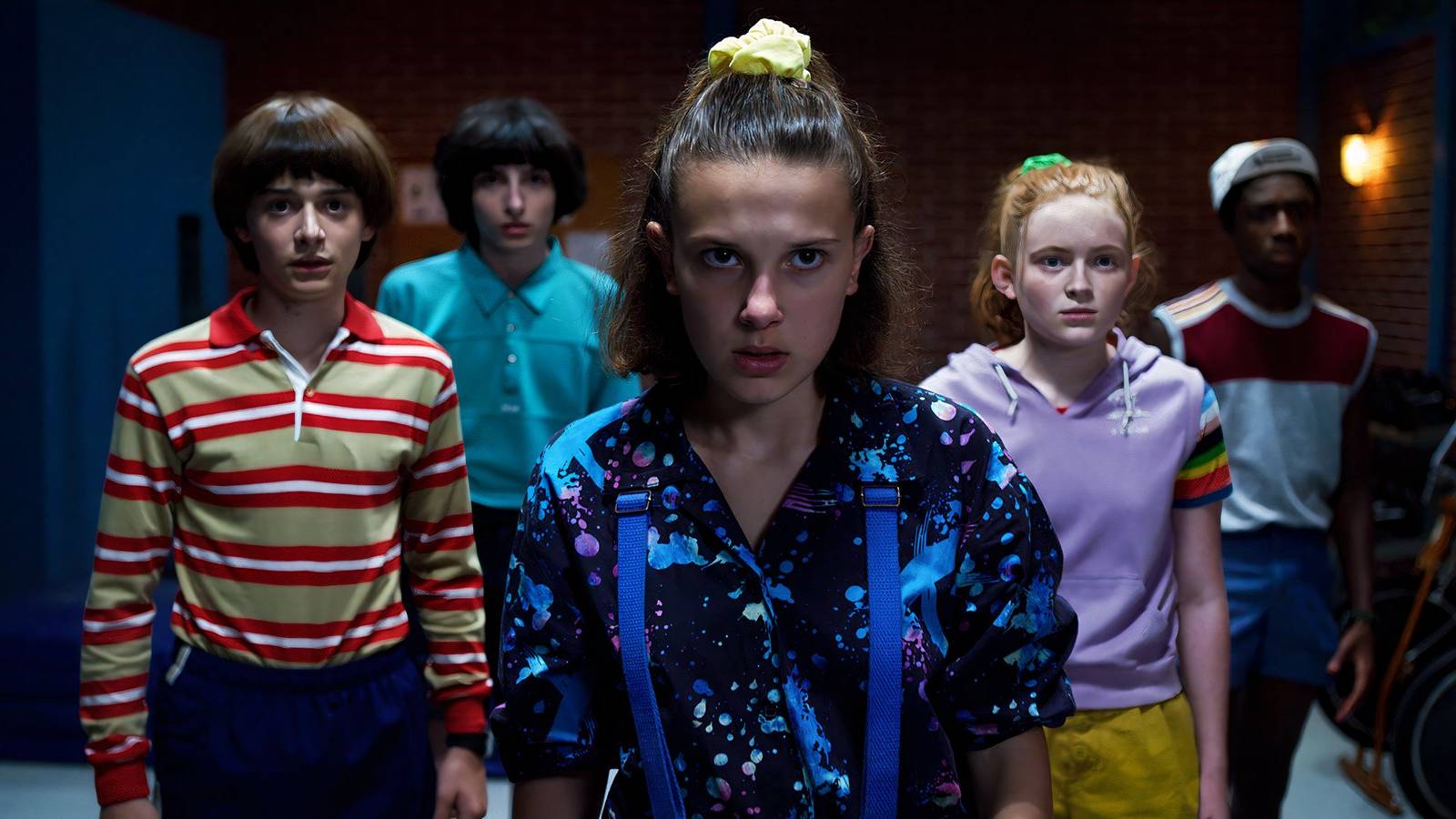 Stranger Things Season 3, Episode 4 cast of kid characters staring ahead somberly.