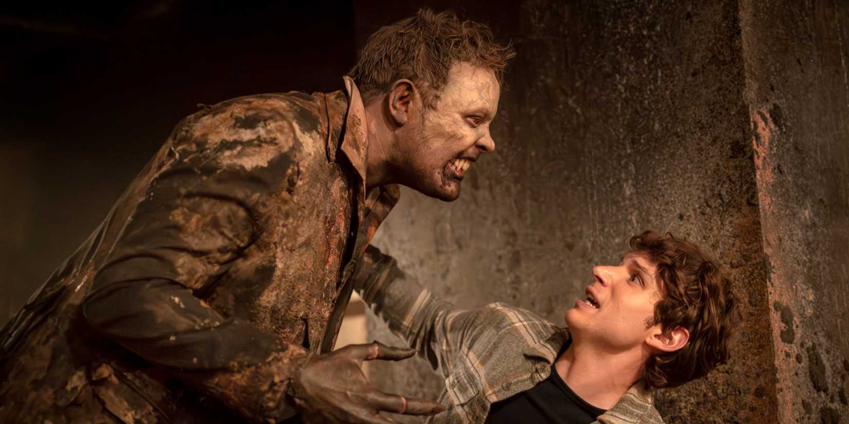 Nicholas Denton as Guy Anatole with a feral vampire hovering over him in Talamasca: The Secret Order