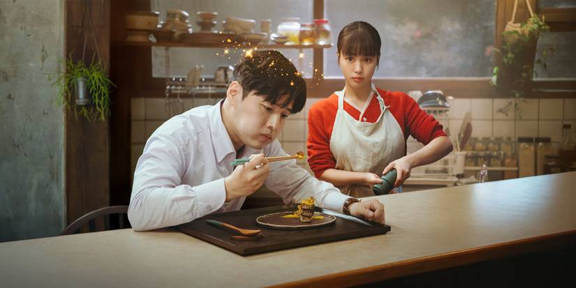 Kang Ha-neul eating while Go Min-si hovers behind him, watching him eat in the poster for Tastefully Yours.