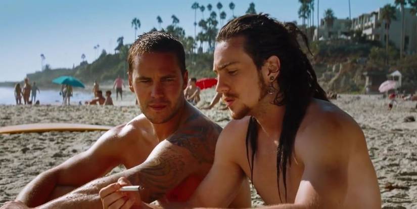 Taylor Kitsch and Aaron Taylor-Johnson in Savages