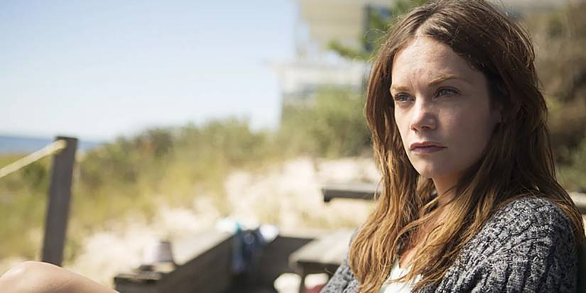 Alison, in a sweater, on the beach in 'The Affair'