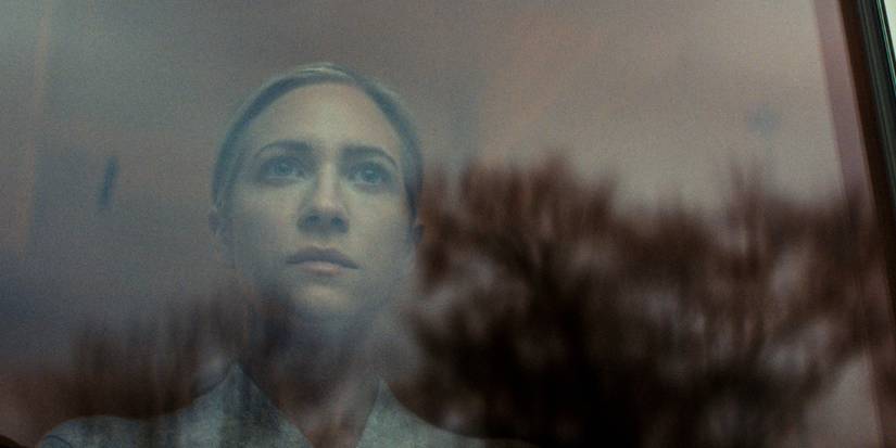 Brittany Snow as Nina Jarvis looks out of the window on 'The Beast in Me.'