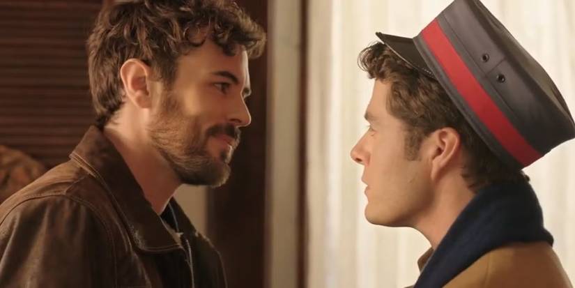 Two guys looking at each other in The Christmas Setup