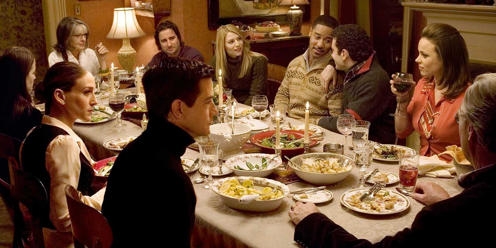 The cast of The Family Stone sitting at the table at an awkward dinner scene.