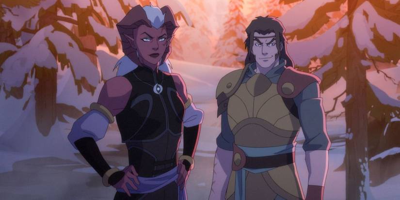 Zara and Kashaw standing in a snowy forest