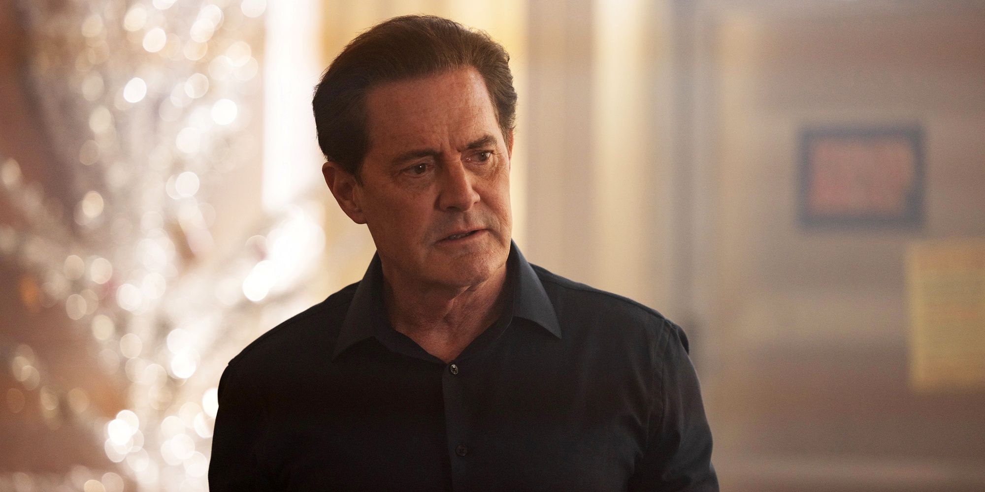 Kyle MacLaclan as Donald Washberg wearing a black shirt in The Lowdown