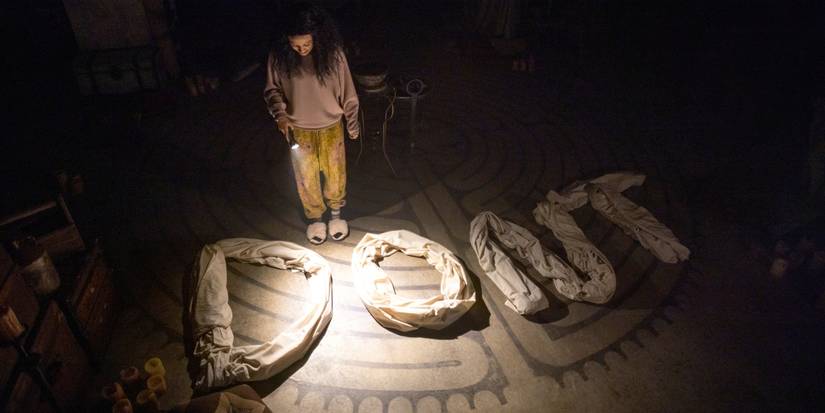 Annarah Cymon as Sandra with an ominous message saying 'Don't' in bedsheets on 'The Midnight Club.'