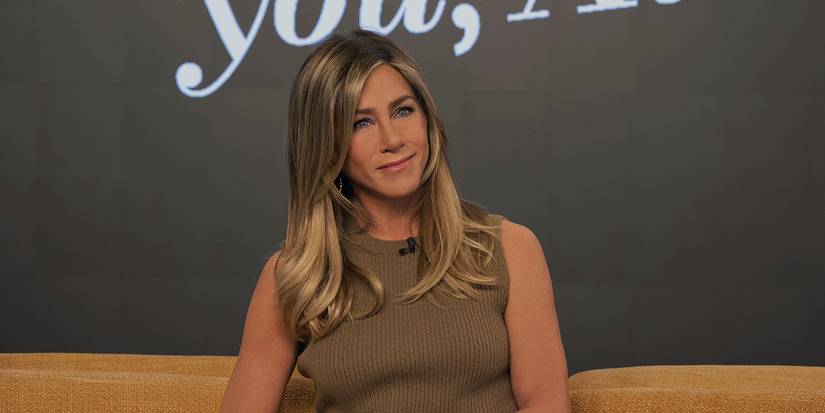 Alex sitting on the couch on air in The Morning Show.