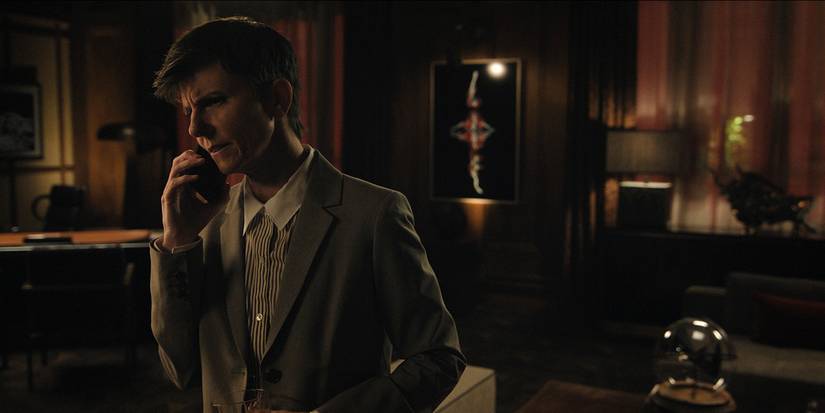 Amanda in the dark on the phone in The Morning Show.