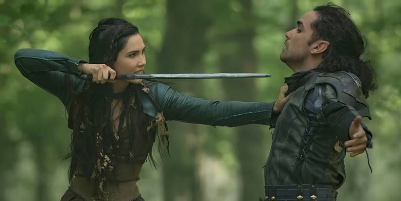 Talon (Jessica Green) threatens Zed (Reece Ritchie) in The Outpost