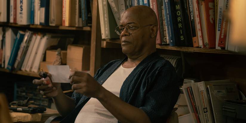 Samuel L. Jackson sits among books in Tulsa King Season 3 Episode 9
