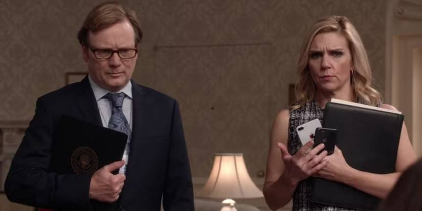 Rhea Seehorn as Michelle York, next to another man, in 'Veep' Season 7.