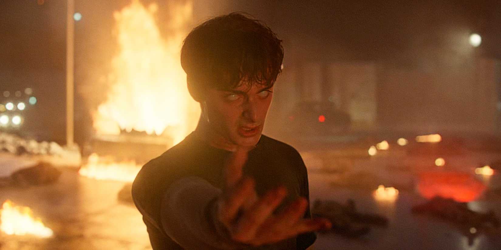 Will Byers reaches out, tapping into his powers with eyes rolled back in Stranger Things Season 5 Volume 1.