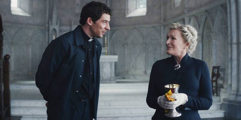 Jud talking with Martha in a church.