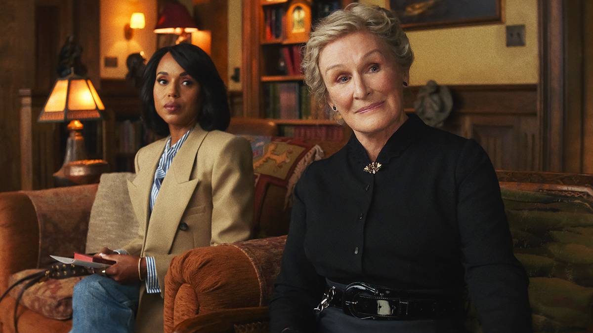 Vera and Martha sitting in armchairs listening to someone speaking to them in Wake Up Dead Man.