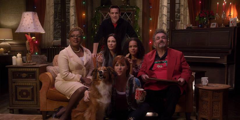 Mrs. Frederic (C.C.H. Pounder), Pete Lattimer (Eddie McClintock), Myka Bering (Joanne Kelly), Claudia Donovan (Allison Scagliotti), Leena (Genelle Williams), and Artie Nielsen (Saul Rubinek) celebrate the holidays in the 'Warehouse 13' episode "The Greatest Gift"