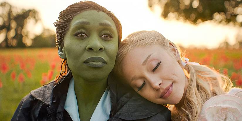 Cynthia Erivo and Ariana Grande as Elphaba and Glinda in a meadow look at the horizon in Wicked: For Good.