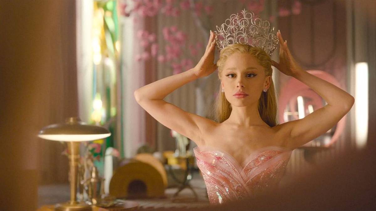 Glinda (Ariana Grande) putting her crown on her head in 'Wicked: For Good'