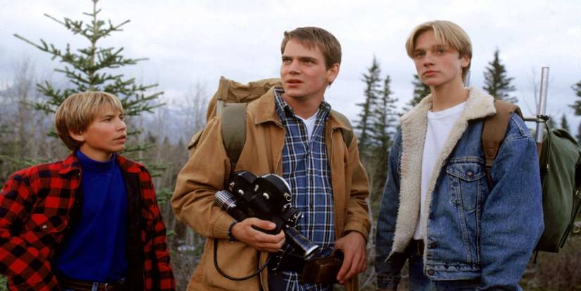 Three young men in the woods in Wild-America