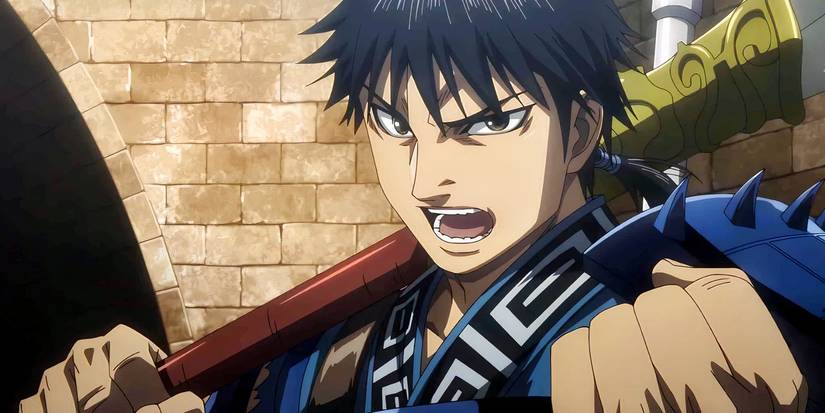 Xin holding up his fist