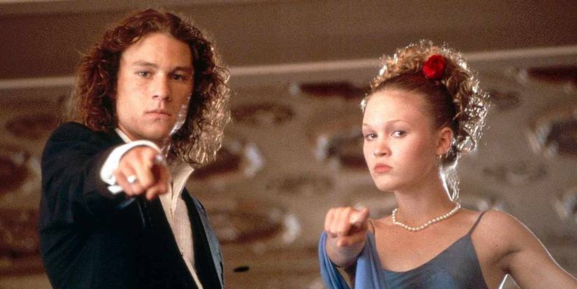 Patrick Verona (Heath Ledger) and Kat Strafford (Julia Stiles) pointing directly into the camera in '10 Things I Hate About You'