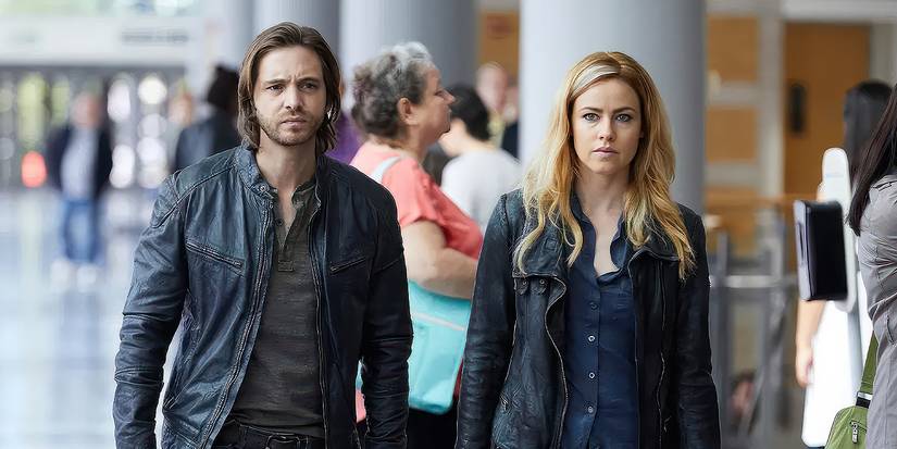 Aaron Stanford's James and Amanda Schull's Cassandra walking together in 12 Monkeys 