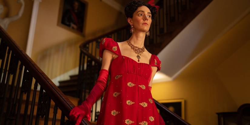 Tanya Reynolds as Caroline Bingley coming down a staircase in The Other Bennet Sister