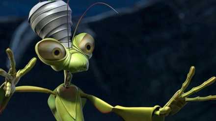 Jonathan Harris as Manny the Praying Mantis wearing a turban and striking a pose in A Bug's Life.