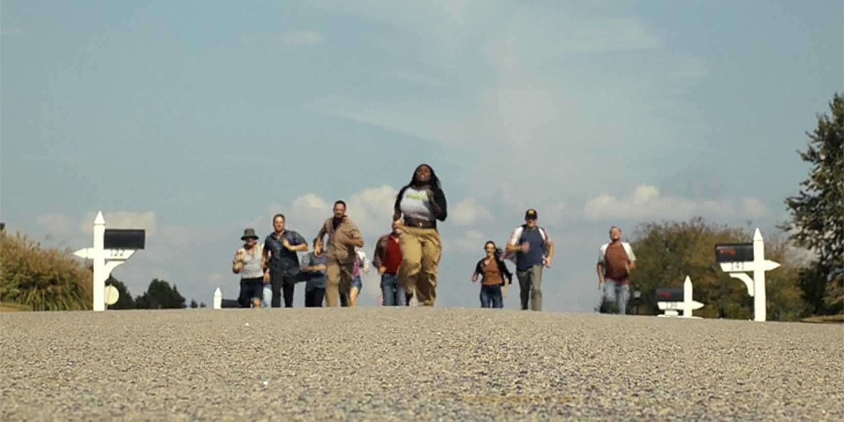 Adebayo being chased in 'Peacemaker' season 2