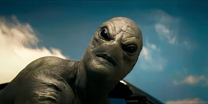 An alien looking down and into the camera in 'Run' (2025)
