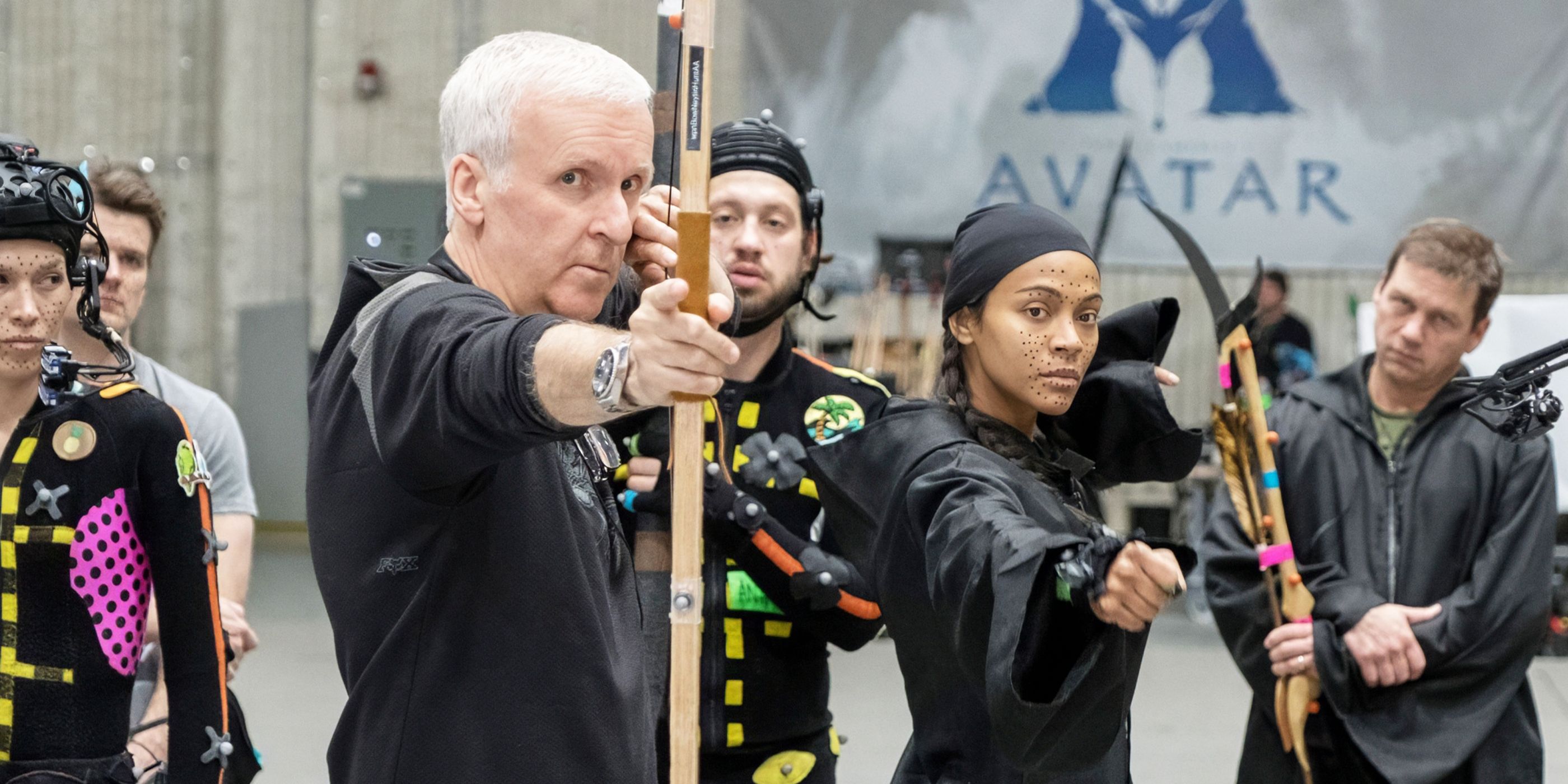 James Cameron on the set of Avatar with Zoe Saldaña next to him