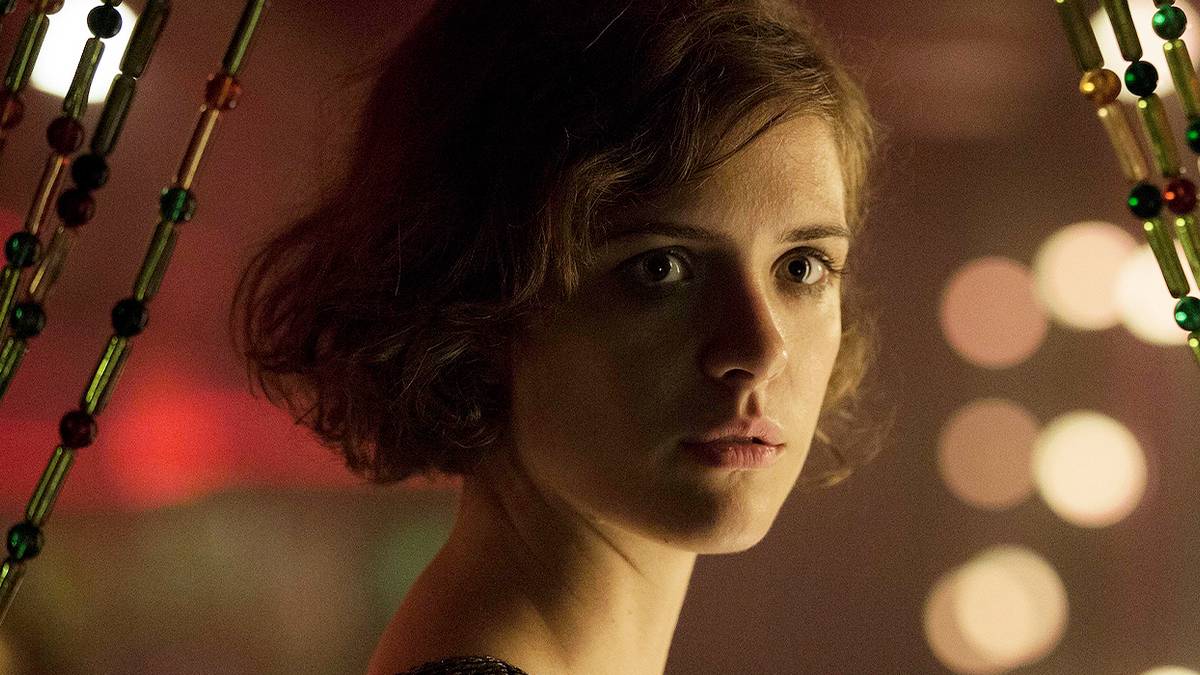 Liv Lisa Fries as Charlotte Ritter tearing up in Babylon Berlin