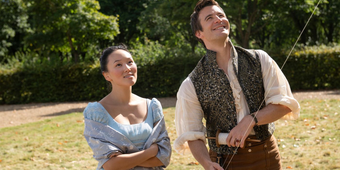 Sophie (Yerin Ha) and Benedict (Luke Thompson) flying a kite in 'Bridgerton' Season 4.